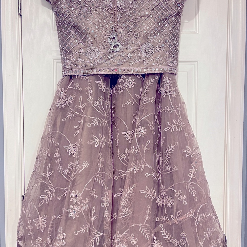 Purple lehenga. . This is brand new. Indian size 40